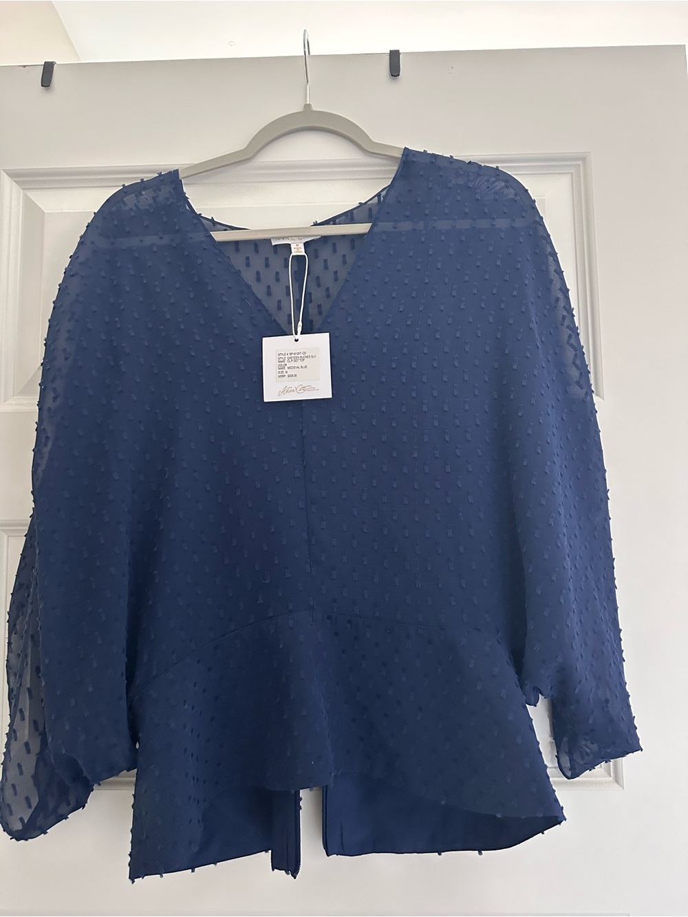Women's Navy Textured V-Neck Peplum Blouse